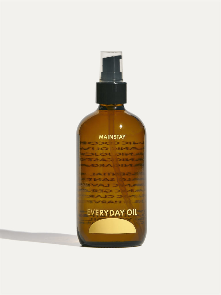 Mainstay Blend by Everyday Oil, organic all natural oil for unisex skin care. Bottle front side.