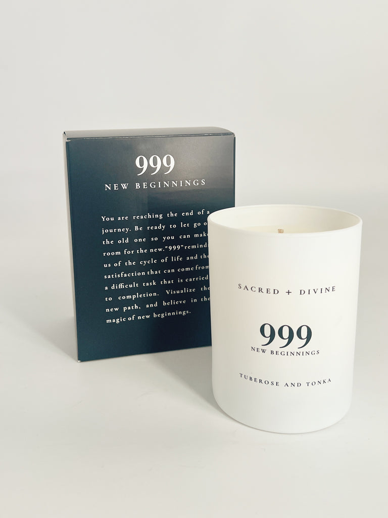 Sacred + Divine 999 New Beginnings candle and box.