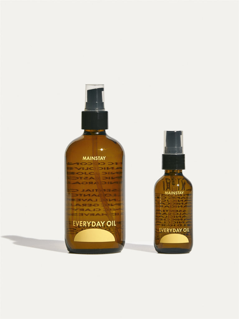 Mainstay Blend by Everyday Oil, organic all natural oil for unisex skin care. Two spray bottles, one travel sized.